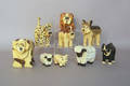 Nine contemporary carved and painted animal figures