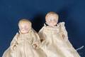 Pair of AllBisque Twin Dolls in Christening Gowns