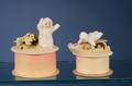 Two Bisque Snow Baby Candy Containers