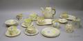 Twentythree Pieces of Belleek Shamrock Basketweave Pattern Porcelain Tea and Tableware