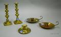 Pair of Brass Pushup Candlesticks a Two Brass and Copper Leafform Chambersticks and a Single Brass Candleho
