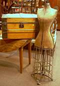 Wooden Dometop Trunk and a Late Victorian Canvasclad Metal and Cast Iron Dress Form