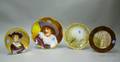 Three Handpainted Porcelain Cabinet Plates and a Portrait Plaque