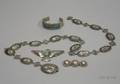 Four Southwestern Silver and Base Metal Jewelry Items