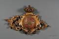 Carved and Painted Giltwood Armorial Wall Plaque