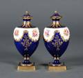 Pair of Wedgwood Bone China Vases and Covers