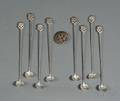 Eight Stavre Gregor and Gladys Panis Beverage Spoons and a Pin