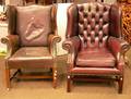 Two Chippendalestyle Tufted Leather Upholstered Mahogany Wing Chairs