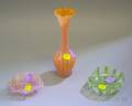 Two Small Venetian Latticino Glass Dishes and a Peachcolored Art Glass Vase
