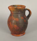 Pennsylvania redware pitcher late 19th c