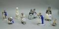 Four Royal Copenhagen and Four Bing  Grondahl Porcelain Figures and Figural Groups