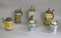 Six Mettlach Pewterlidded Stoneware Steins