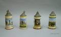 Four German Pewterlidded Porcelain Steins with Lithophane Genre Scene Bases