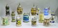 Twelve German Pewterlidded Stoneware and Porcelain Steins