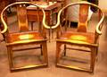 Pair of Chinese Carved Wood Uback Armchairs