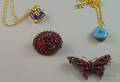 Two Bohemian Garnet Pins and Two Enamel Pendants