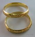 Pair of Antique Style 14kt Gold Canatille and Diamond Embellished Bangles