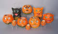 Ten paper mache jackolanterns