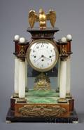 Late Biedermeier Fruitwood Onyx and Gilt Metal Mounted Mantel Clock