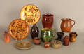 Group of earthenware to include redware stand