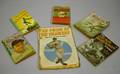 Seven Assorted Baseball Books Comic Books and a Paperback