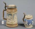 Two Mettlach Relief Steins
