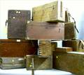 Approximately Thirteen Empty Wood Cases