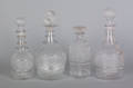 Four colorless blown three mold decanters 19th c