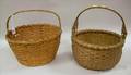 Two Round Woven Handled Splint Baskets