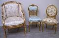 Louis XVI Style Brocade Upholstered Carved Giltwood Armchair and Side Chair and a Louis XV Style Upholstered C