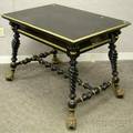 Ebonized Merklin Bros Victorian Turned OneDrawer Library Table Mounted with Brass Grotesque Mask Feet