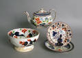 Gaudy Dutch teapot and plate