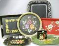 Six Assorted Decorated Tole Trays and a Small Box