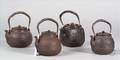 Four Cast Iron Kettles