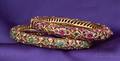 Two 14kt Gold and Gemset Bangle Bracelets India