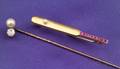 18kt Gold Ruby and Seed Pearl Cricket Bat Pin