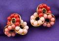 18kt Gold and Coral Triple Knot Earclips Seaman Schepps