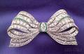 Art Deco Platinum Emerald and Diamond Bow Brooch