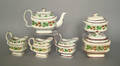 Group of Staffordshire tea articles in the strawberry pattern early 19th c