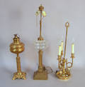 Five gilt metal table lamps