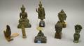 Eight Assorted Metal and Wood Buddha Figures