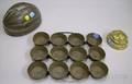 Tin Melonform Mold a Metal TwelveMuffin Baking Tray and a Brass Food Mold