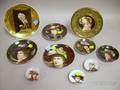 Ten Small European Painted Porcelain Portrait Plates of Elegant Ladies