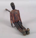 Carved and painted jig toy of an African American late 19th c