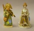 Hummel Ceramic Figure and a Continentalstyle Porcelain Figure of a Seated Woman