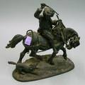 Cast Iron Boy on a Horse with Dog Figural Group