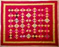 Pieced diamond pattern quilt