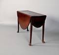 George III mahogany drop leaf dining table