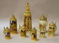 Seven German Stoneware Steins and a Porcelain Erotic Lithophane Stein