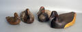 Four carved and painted duck decoys